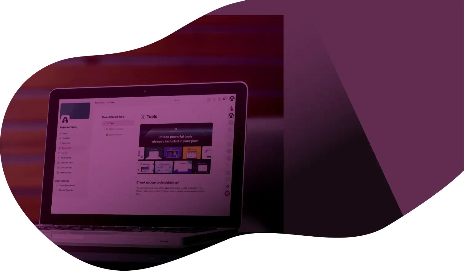 Laptop showing the branded Alchemy membership portal